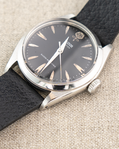 1962 Vintage Tudor Oyster Shock-Resisting Ref. 7934 - Matte Black 'Big Rose' Dial