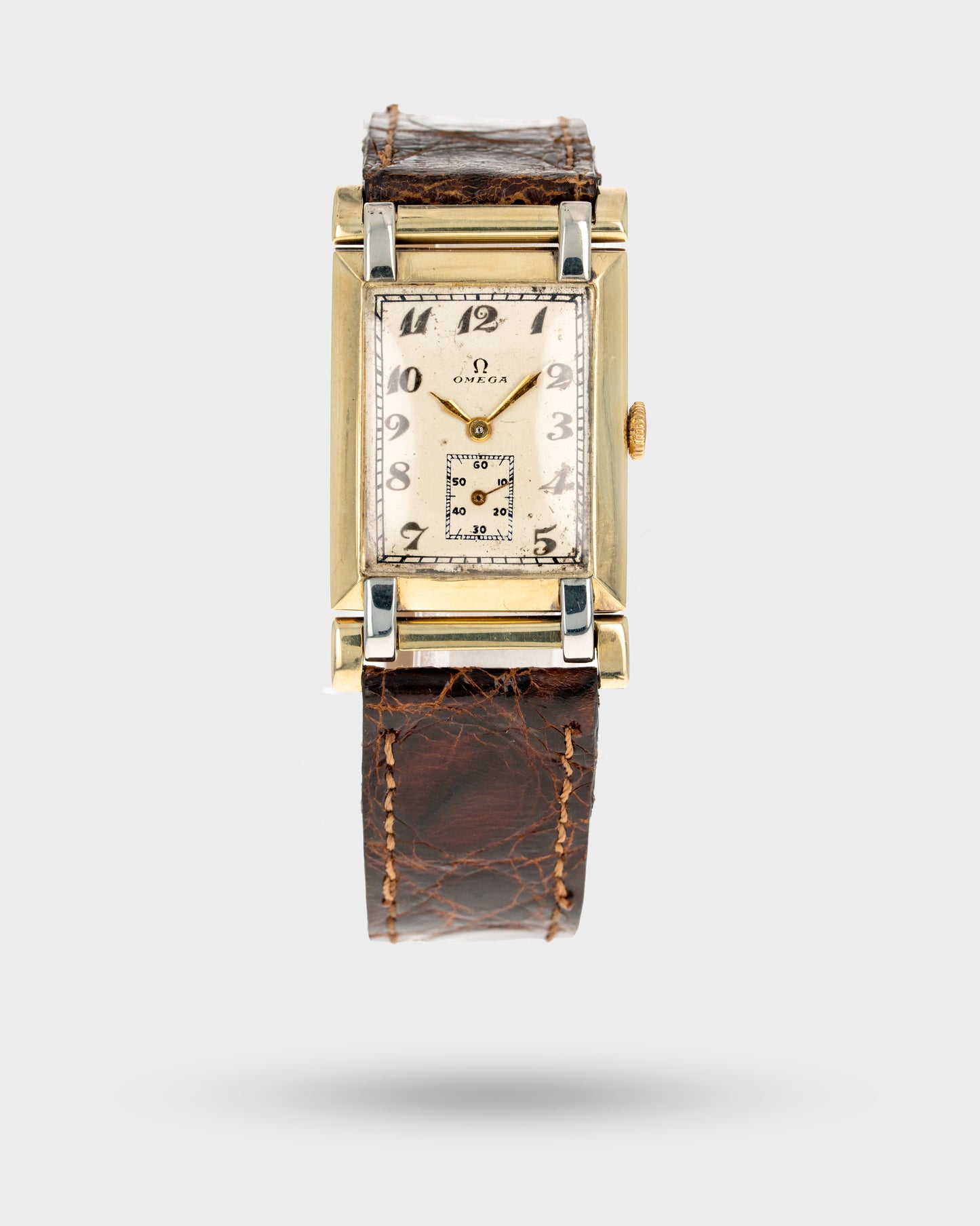 1930 Vintage	Two-Tone Omega	Art Deco Tank with Articulating Swivel Lugs Ref. 886 19.4 - Silver Dial with Breguet Numerals