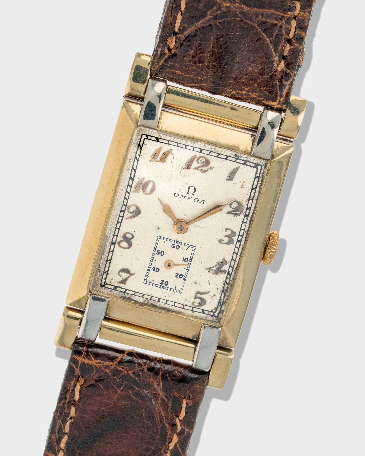 1930 Vintage	Two-Tone Omega	Art Deco Tank with Articulating Swivel Lugs Ref. 886 19.4 - Silver Dial with Breguet Numerals
