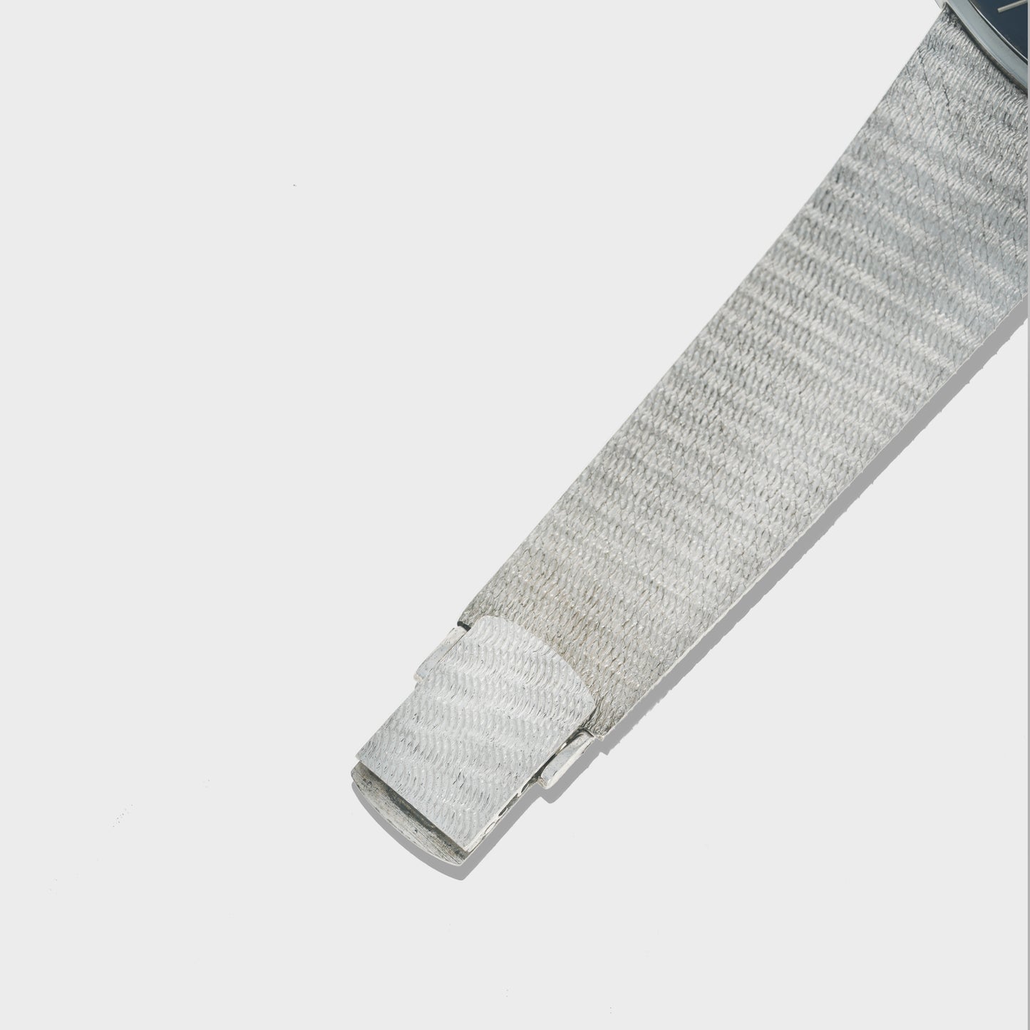 1970's Vintage Universal Geneve White Shadow Automatic - Cushion Shaped Blue Dial