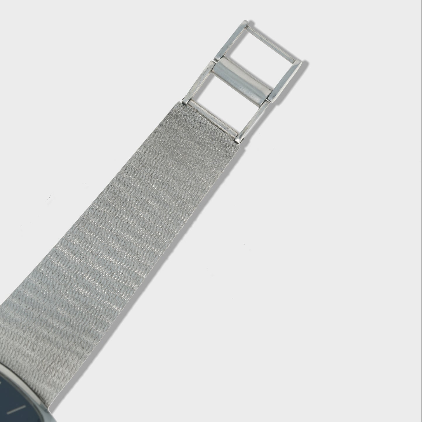 1970's Vintage Universal Geneve White Shadow Automatic - Cushion Shaped Blue Dial