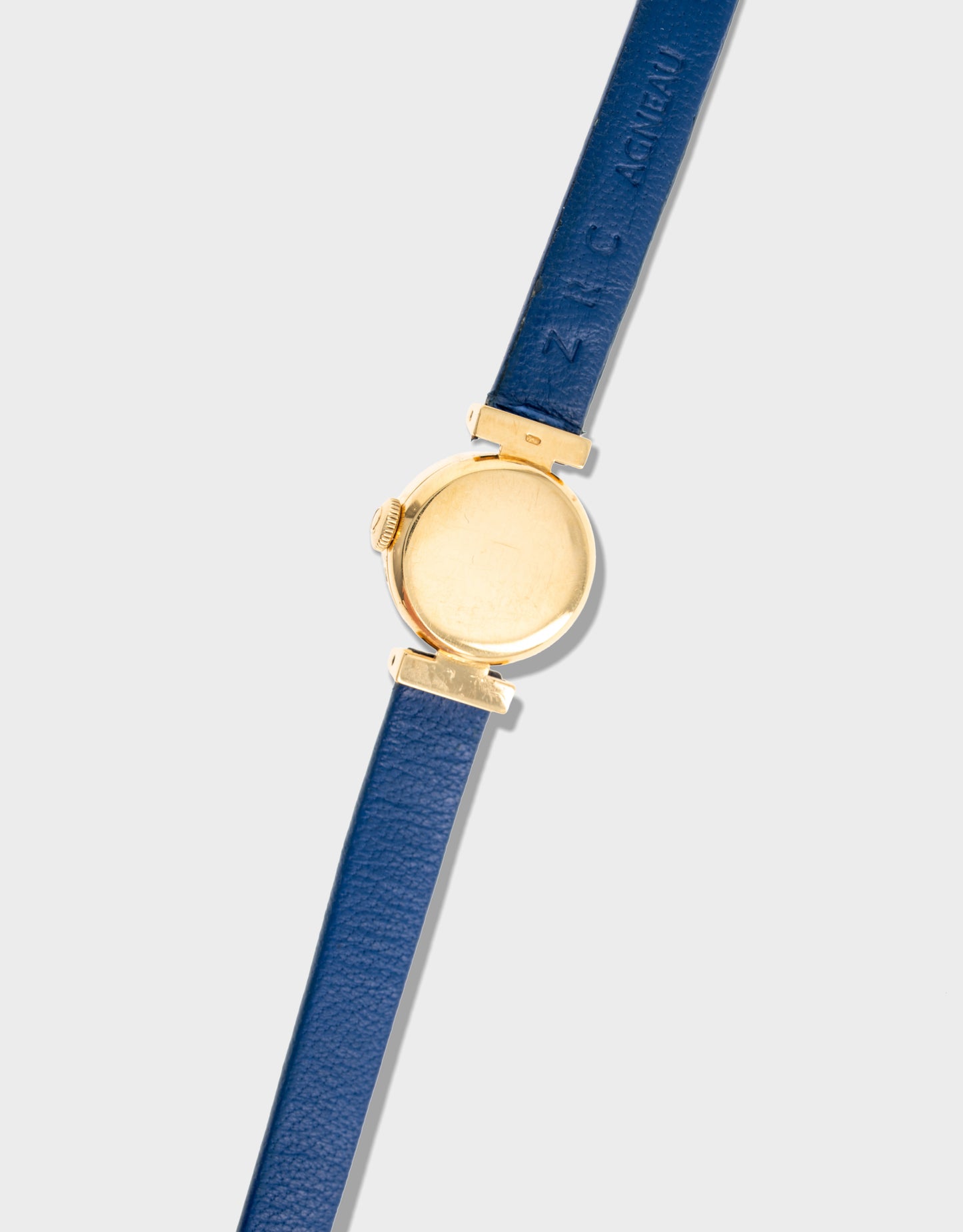 1962 Omega 18K Yellow Gold Textured Hooded Bar-lug Watch - Silver Dial